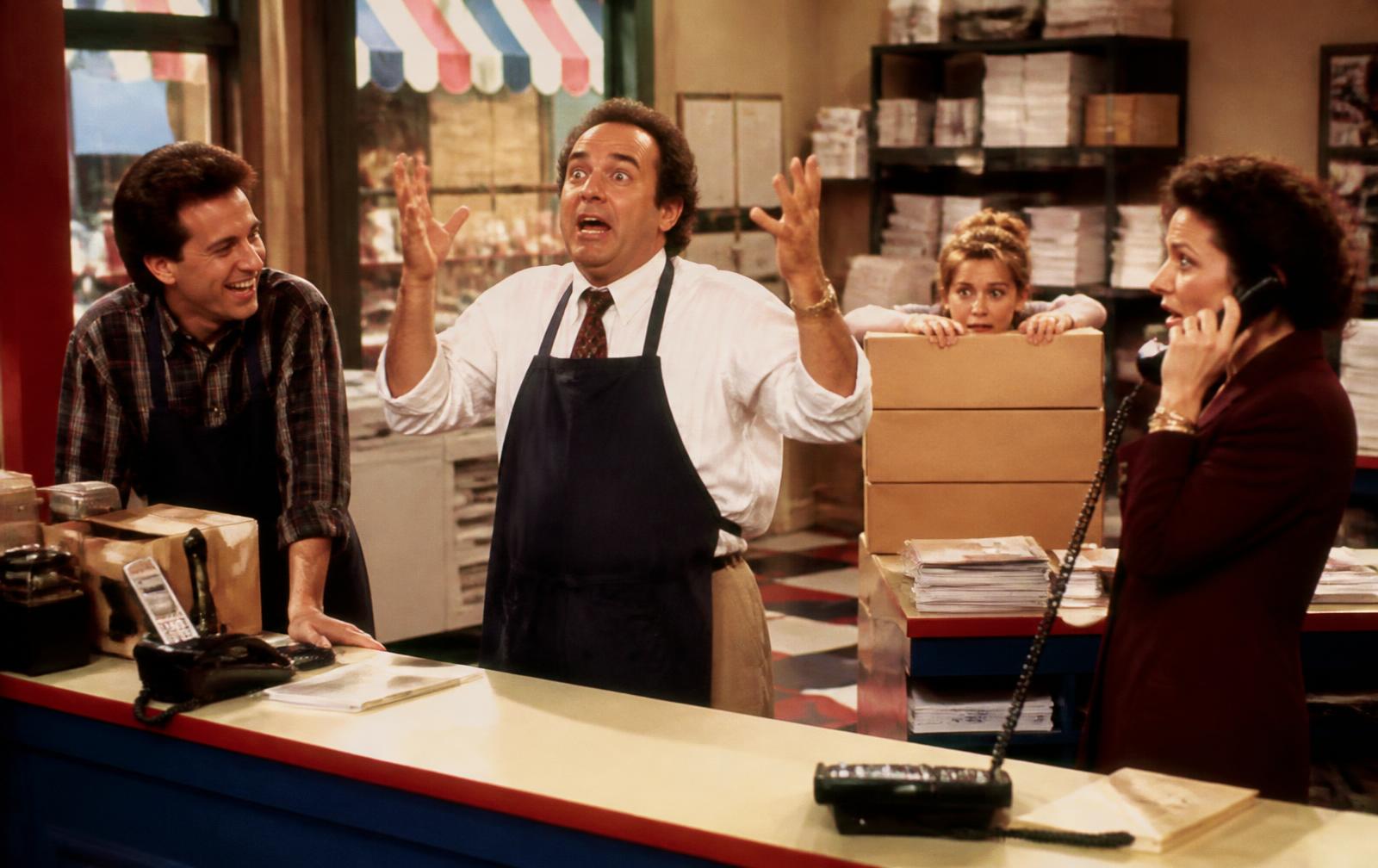 A business owner and his staff caught mid-crisis in an episode of their company sitcom